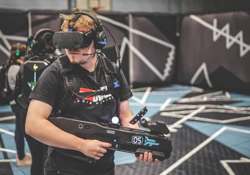 man playing untethered VR arena experience